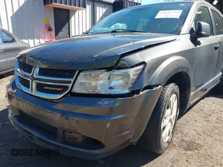 2016 Dodge Journey SE with VIN 3C4PDCAB6GT104588, listed as a IAAI auction lot 41823732 with 133,819 mi miles. Bid and sale history available at carsss.com. Image 6.