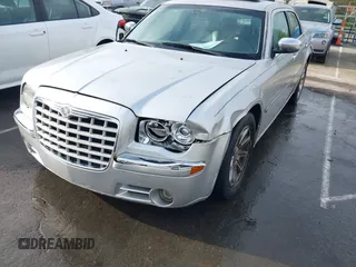 2006 Chrysler 300 C with VIN 2C3KA63H16H352507, listed as a IAAI auction lot 41926057 with 129,962 mi miles. Bid and sale history available at carsss.com. Image 6.