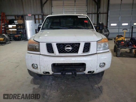 2010 Nissan Titan Pro-4X with VIN 1N6BA0EC3AN312601, listed as a Copart auction lot 52633455 with 161,260 mi miles and Salvage title. Bid and sale history available at DreamBid. Image 5.