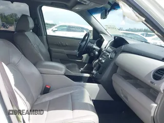 2012 Honda Pilot Touring with VIN 5FNYF3H9XCB035494, listed as a IAAI auction lot 42011362 with 271,887 mi miles and . Bid and sale history available at carsss.com. Image 5.