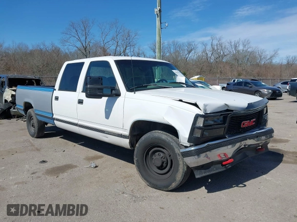 1996 GMC Sierra 1500 with VIN 1GTGC33R4TF018147, listed as a IAAI auction lot 41612770 with 106,443 mi miles and . Bid and sale history available at DreamBid. Image 1.