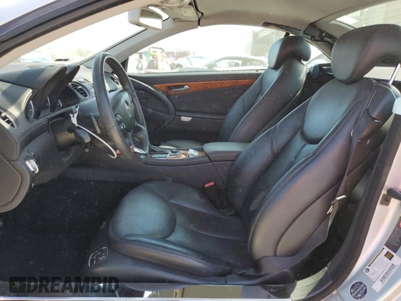 2007 Mercedes-Benz SL 550 with VIN WDBSK71F57F134782, listed as a Copart auction lot 47041625 with 54,995 mi miles and Salvage title. Bid and sale history available at DreamBid. Image 7.