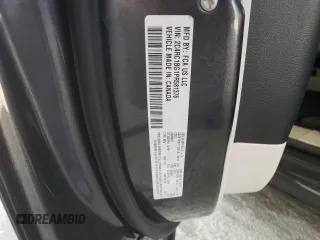 2023 Chrysler Pacifica Touring L with VIN 2C4RC1BG1PR581376, listed as a Copart auction lot 59901915 with 57,411 mi miles and Salvage title. Bid and sale history available at DreamBid. Image 14.