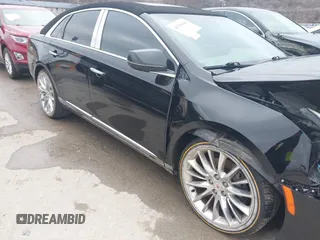 2013 Cadillac XTS Platinum z VIN 2G61V5S37D9194227, wystawiony jako IAAI lot #41510449 z przebiegiem 114 243 mil mil oraz . Historia ofert i sprzedaży dostępna na DreamBid. Obrazek 17.