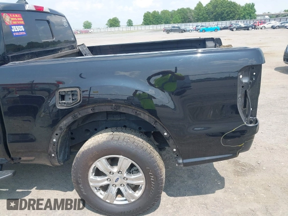 2019 Ford Ranger XL z VIN 1FTER1EHXKLA36781, wystawiony jako IAAI lot #42349085 z przebiegiem 39 311 mil mil oraz . Historia ofert i sprzedaży dostępna na DreamBid. Obrazek 21.