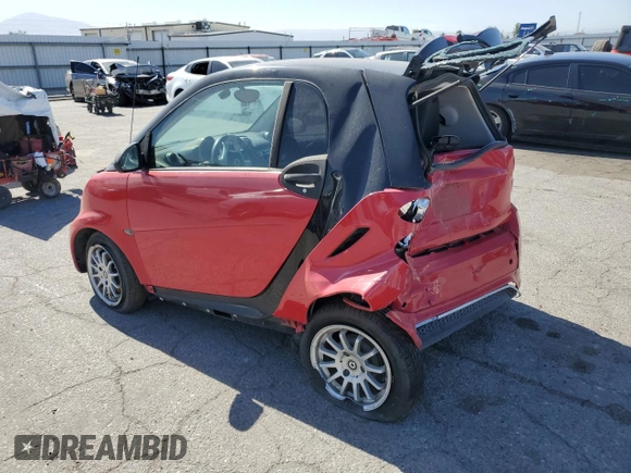 2014 Smart fortwo Pure z VIN WMEEJ3BA6EK745679, wystawiony jako Copart lot #56242784 z przebiegiem 86 991 mil mil oraz Szkoda całkowita • Salvage title. Historia ofert i sprzedaży dostępna na DreamBid. Obrazek 2.