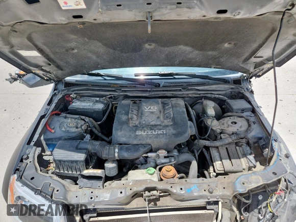 2008 Suzuki Grand Vitara with VIN JS3TE941284104419, listed as a Copart auction lot 63089375 with 216,057 mi miles and Salvage title. Bid and sale history available at DreamBid. Image 12.