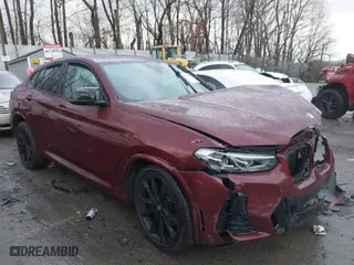 2022 BMW X4 M40i with VIN 5UX43DT09N9J96761, listed as a IAAI auction lot 41675333 with 1 mi miles. Bid and sale history available at carsss.com. Image 1.