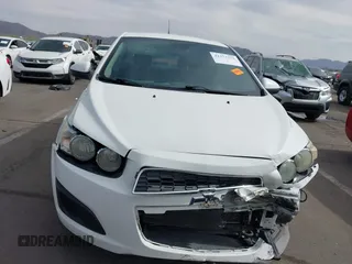 2013 Chevrolet Sonic LS with VIN 1G1JA5SH9D4249356, listed as a IAAI auction lot 42373352 with 151,337 mi miles and . Bid and sale history available at DreamBid. Image 13.