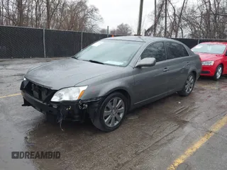 2007 Toyota Avalon XL with VIN 4T1BK36BX7U238496, listed as a IAAI auction lot 41706820 with 162,027 mi miles. Bid and sale history available at carsss.com. Image 2.