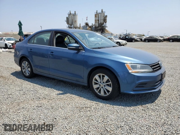 2015 Volkswagen Jetta SE with VIN 3VWD17AJ1FM421162, listed as a Copart auction lot 63873695 with 191,976 mi miles and Salvage title. Bid and sale history available at DreamBid. Image 4.