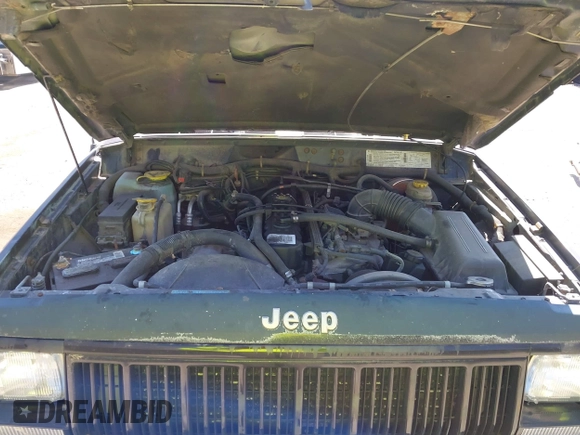 1996 Jeep Cherokee SE z VIN 1J4FJ28S2TL128682, wystawiony jako IAAI lot #41752453 z przebiegiem 270 167 mil mil oraz . Historia ofert i sprzedaży dostępna na DreamBid. Obrazek 10.