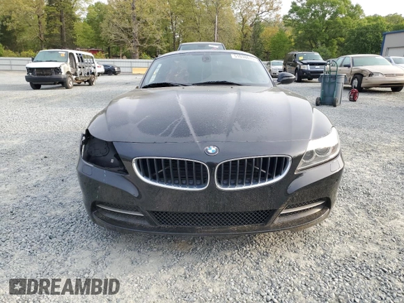 2016 BMW Z4 sDrive28i with VIN WBALL5C50GP557837, listed as a Copart auction lot 51038615 with 59,878 mi miles and Salvage Title. Bid and sale history available at carsss.com. Image 5.