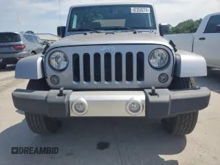 2015 Jeep Wrangler Sahara with VIN 1C4AJWBG1FL705900, listed as a Copart auction lot 62353275 with 64,866 mi miles and Salvage title. Bid and sale history available at DreamBid. Image 5.