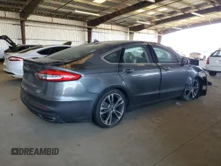 2020 Ford Fusion Titanium with VIN 3FA6P0K92LR115615, listed as a Copart auction lot 60471975 with 73,069 mi miles and Salvage title. Bid and sale history available at DreamBid. Image 3.