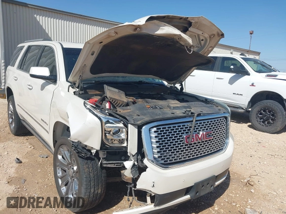 2015 GMC Yukon Denali with VIN 1GKS2CKJ3FR568729, listed as a IAAI auction lot 41741987 with 154,729 mi miles. Bid and sale history available at carsss.com. Image 6.