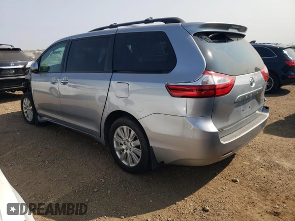 2017 Toyota Sienna LE with VIN 5TDJZ3DC1HS158937, listed as a Copart auction lot 70856204 with 110,572 mi miles and Salvage title. Bid and sale history available at DreamBid. Image 2.