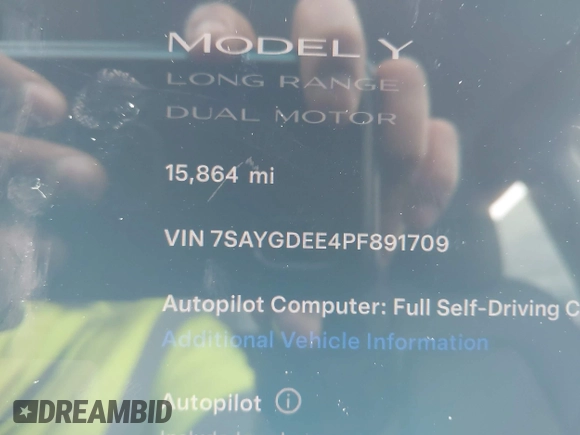 2023 Tesla Model Y Long Range with VIN 7SAYGDEE4PF891709, listed as a IAAI auction lot 41944893 with 15,864 mi miles. Bid and sale history available at carsss.com. Image 15.