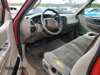 2001 Ford F-150 XL z VIN 1FTRX08L91KF90321, wystawiony jako Copart lot #79450044 z przebiegiem 320 953 mil mil oraz Czysty tytuł • Clean title. Historia ofert i sprzedaży dostępna na DreamBid. Obrazek 8.