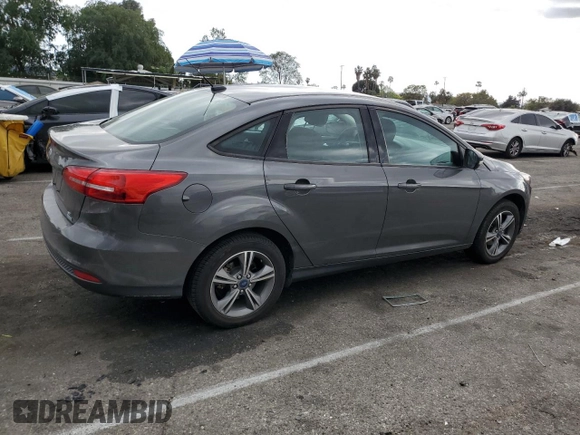 2017 Ford Focus SE with VIN 1FADP3FE3HL235896, listed as a Copart auction lot 50910975 with 74,502 mi miles and Salvage Title. Bid and sale history available at carsss.com. Image 3.
