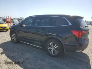 2017 Honda Pilot EX-L z VIN 5FNYF6H59HB092985, wystawiony jako Copart lot #55621225 z przebiegiem 86 510 mil mil oraz Szkoda całkowita • Salvage title. Historia ofert i sprzedaży dostępna na DreamBid. Obrazek 2.