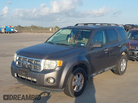 2011 Ford Escape XLT with VIN 1FMCU0D70BKA27369, listed as a IAAI auction lot 40970437 with 119,719 mi miles. Bid and sale history available at carsss.com. Image 2.
