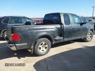 2001 Ford F-150 XL with VIN 2FTRX07W61CA71131, listed as a IAAI auction lot 41375828 with 216,340 mi miles. Bid and sale history available at carsss.com. Image 4.