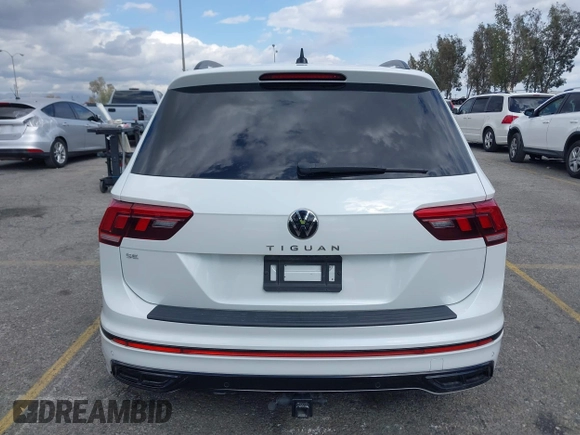 2023 Volkswagen Tiguan SE R-Line Black with VIN 3VVCB7AX3PM133002, listed as a IAAI auction lot 41902721 with 32,915 mi miles and . Bid and sale history available at DreamBid. Image 16.