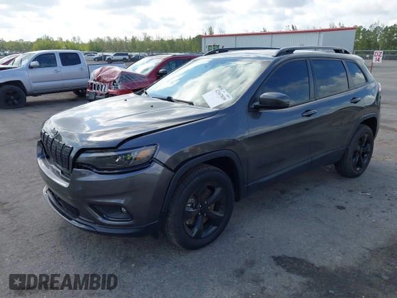 2021 Jeep Cherokee Latitude Plus with VIN 1C4PJMLB6MD117029, listed as a IAAI auction lot 42167039 with 68,717 mi miles and . Bid and sale history available at DreamBid. Image 2.