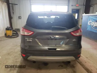 2016 Ford Escape SE z VIN 1FMCU9GX7GUA06269, wystawiony jako Copart lot #51110775 z przebiegiem 131 959 mil mil oraz Czysty tytuł • Clean title. Historia ofert i sprzedaży dostępna na DreamBid. Obrazek 6.