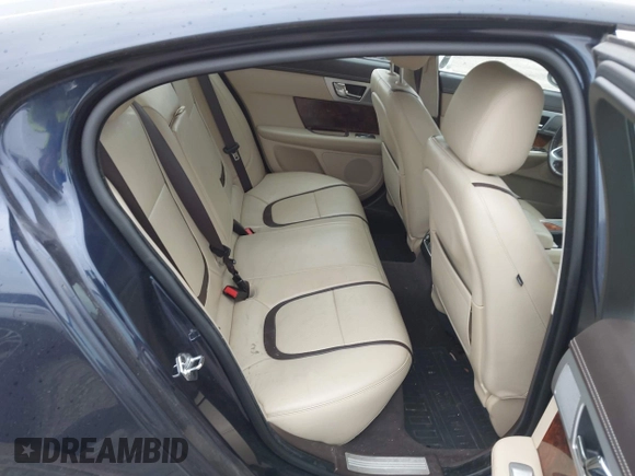 2015 Jaguar XF V6 Portfolio with VIN SAJWJ0FF5F8U67140, listed as a IAAI auction lot 41967522 with 68,000 mi miles. Bid and sale history available at carsss.com. Image 8.