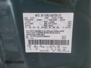 2007 Ford F-150 XL with VIN 1FTPX12V07FA66063, listed as a Copart auction lot 55401245 with 191,104 mi miles and Salvage title. Bid and sale history available at DreamBid. Image 12.