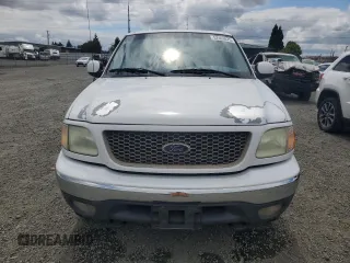 2002 Ford F-150 XL with VIN 1FTRX18L62KC53807, listed as a Copart auction lot 57463075 with 173,301 mi miles and Salvage title. Bid and sale history available at DreamBid. Image 5.