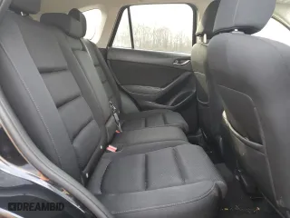 2016 Mazda CX-5 Touring with VIN JM3KE4CY7G0860868, listed as a Copart auction lot 51203415 with 86,768 mi miles and Salvage Title. Bid and sale history available at carsss.com. Image 11.