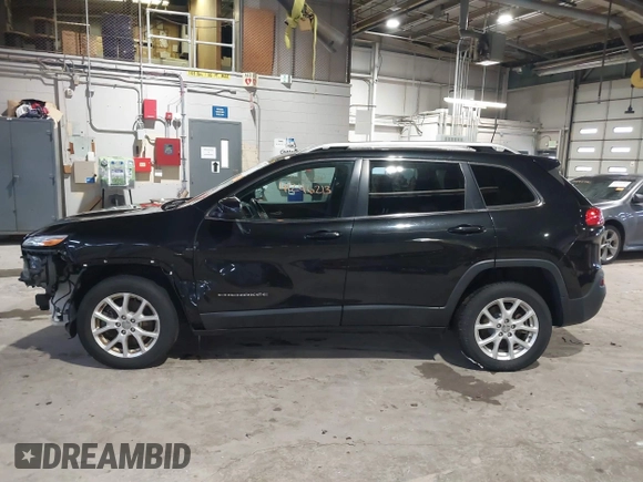 2015 Jeep Cherokee Latitude with VIN 1C4PJMCB5FW768854, listed as a IAAI auction lot 41246213 with 131,112 mi miles. Bid and sale history available at carsss.com. Image 14.
