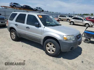 2005 Ford Escape XLT with VIN 1FMYU931X5KC50904, listed as a Copart auction lot 63425805 with 210,347 mi miles and Clean title. Bid and sale history available at DreamBid. Image 4.
