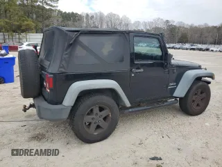 2012 Jeep Wrangler Sport with VIN 1C4GJWAG6CL167329, listed as a Copart auction lot 88895815 with 147,448 mi miles and Clean Title. Bid and sale history available at DreamBid. Image 3.