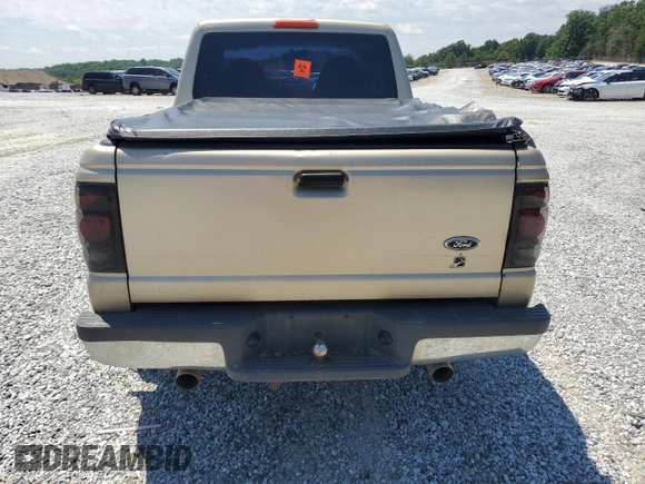 2000 Ford Ranger XL with VIN 1FTYR14VXYTA70121, listed as a Copart auction lot 56024985 with 271,426 mi miles and Salvage title. Bid and sale history available at DreamBid. Image 6.