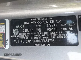 2023 Kia Forte GT-Line z VIN 3KPF54AD6PE684798, wystawiony jako IAAI lot #41921089 z przebiegiem 24 670 mil mil oraz . Historia ofert i sprzedaży dostępna na DreamBid. Obrazek 9.