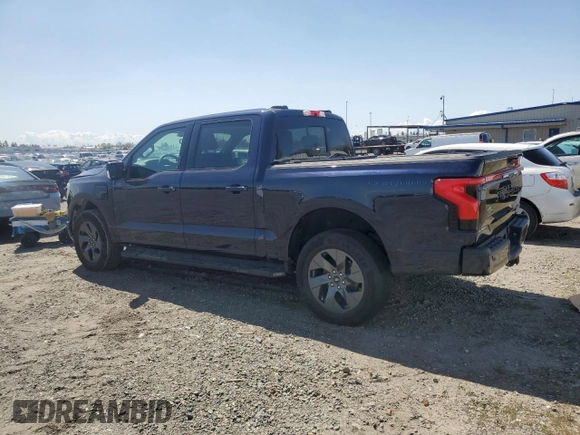 2023 Ford F-150 Lightning Pro z VIN 1FT6W1EV0PWG28960, wystawiony jako Copart lot #51858855 z przebiegiem Nie podano mil oraz Nie do naprawy • Non repairable. Historia ofert i sprzedaży dostępna na DreamBid. Obrazek 2.