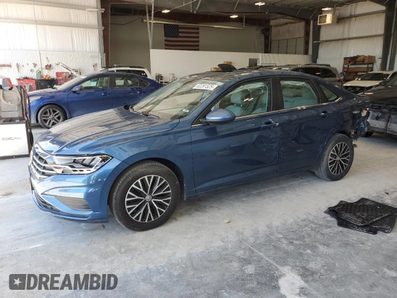 2019 Volkswagen Jetta S z VIN 3VWC57BU4KM209973, wystawiony jako Copart lot #62281525 z przebiegiem 46 927 mil mil oraz Czysty tytuł • Clean title. Historia ofert i sprzedaży dostępna na DreamBid. Obrazek 1.