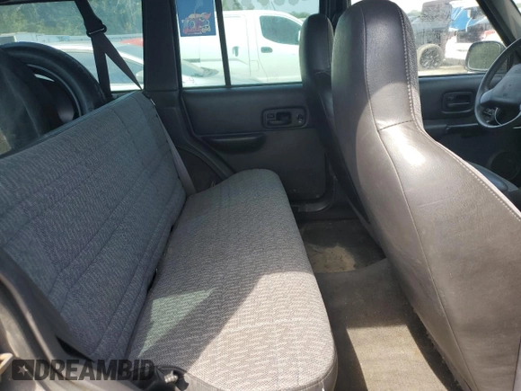 2001 Jeep Cherokee Sport with VIN 1J4FT48S31L596648, listed as a Copart auction lot 54101345 with 190,688 mi miles and Clean title. Bid and sale history available at DreamBid. Image 11.