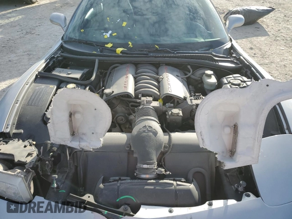 2004 Chevrolet Corvette with VIN 1G1YY22G545120797, listed as a Copart auction lot 46134715 with 97,786 mi miles and Salvage Title. Bid and sale history available at carsss.com. Image 11.