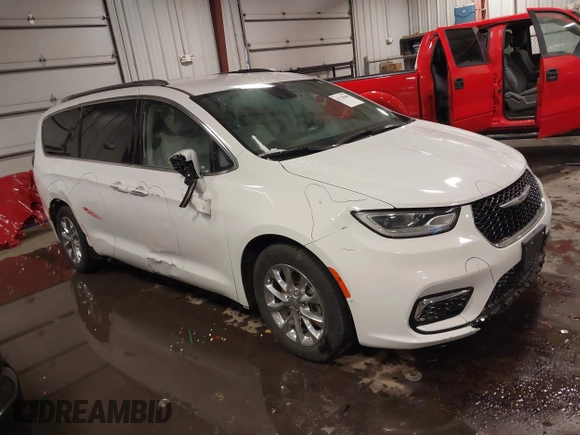 2021 Chrysler Pacifica Touring L with VIN 2C4RC1BG3MR504293, listed as a IAAI auction lot 41728608 with 70,487 mi miles and . Bid and sale history available at DreamBid. Image 1.