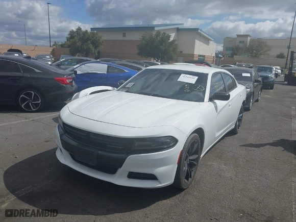 2018 Dodge Charger SXT with VIN 2C3CDXBG8JH297718, listed as a IAAI auction lot 41910526 with 63459 miles. Bid and sale history available at carsss.com. Image 2.