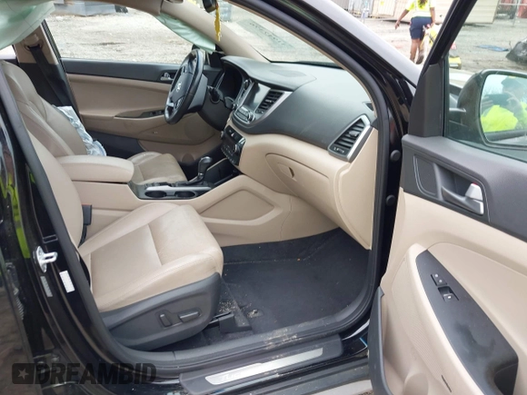 2017 Hyundai Tucson Value z VIN KM8J33A29HU369601, wystawiony jako IAAI lot #41947376 z przebiegiem 140 000 mil mil oraz . Historia ofert i sprzedaży dostępna na DreamBid. Obrazek 5.