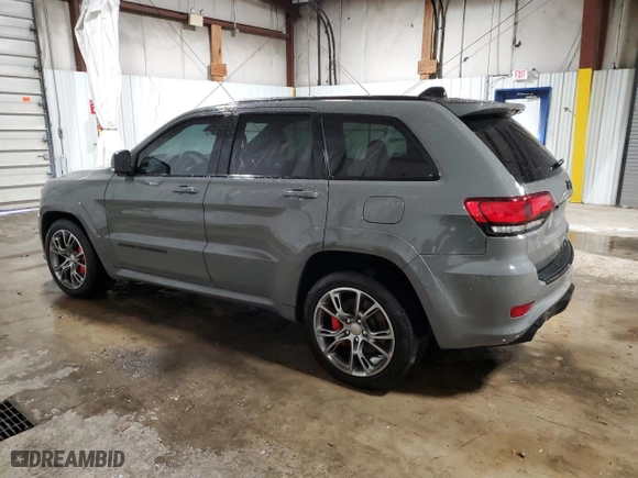 2021 Jeep Grand Cherokee SRT with VIN 1C4RJFDJ5MC667774, listed as a Copart auction lot 42484435 with 43,387 mi miles and Salvage Title. Bid and sale history available at carsss.com. Image 2.