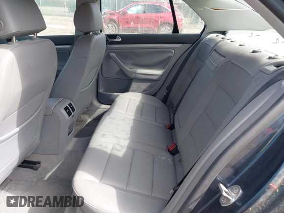 2006 Volkswagen Jetta 2.5L z VIN 3VWRF71K76M625318, wystawiony jako IAAI lot #41872926 z przebiegiem 69 892 mil mil oraz . Historia ofert i sprzedaży dostępna na DreamBid. Obrazek 8.