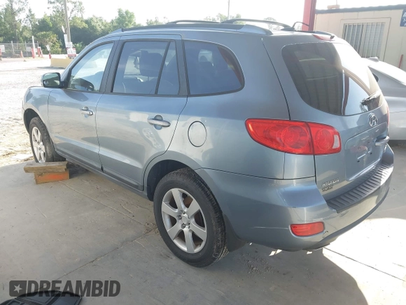 2009 Hyundai Santa Fe SE with VIN 5NMSH73EX9H318027, listed as a IAAI auction lot 42668676 with 185,610 mi miles and . Bid and sale history available at DreamBid. Image 3.