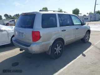 2003 Honda Pilot EX with VIN 2HKYF18443H571688, listed as a IAAI auction lot 42097297 with 313,910 mi miles. Bid and sale history available at carsss.com. Image 4.